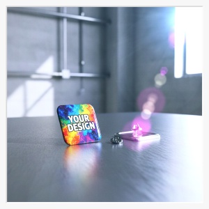 Frontalansicht eines quadratischen 37x37 mm Buttons mit dem Aufdruck "YOUR DESIGN"